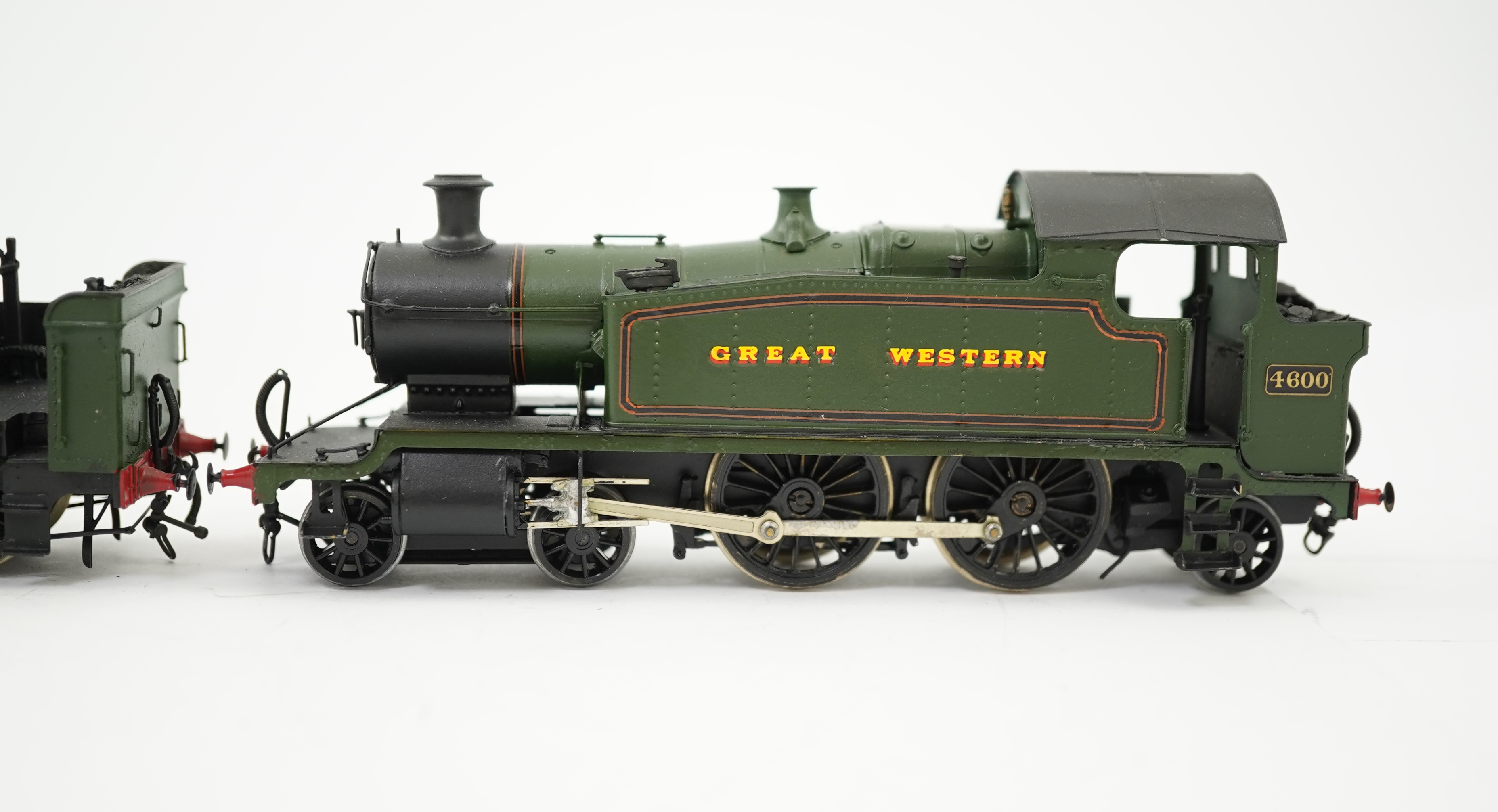 Four 00 gauge kit built GWR tank locomotives, three brass and white metal; a 14xx class 2-4-0T, 1458, together with an 517 class 0-4-2T, 574, and a 633 class 0-4-2T, 633, plus a plastic/resin and metal 46xx class 4-4-2T,
